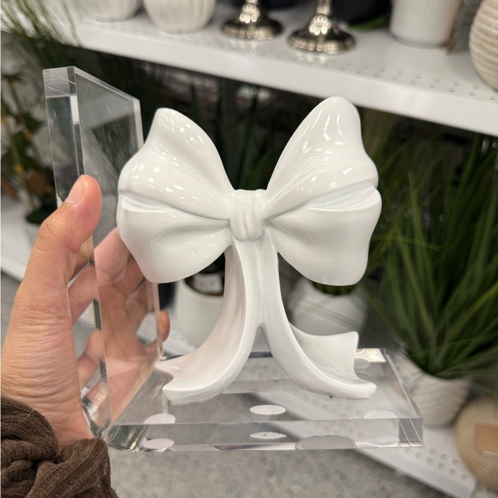 White Ceramic Bow Figurine on Clear Acrylic Base bookend